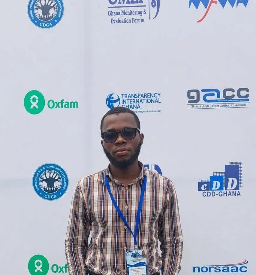 Festus Boamah at the Ghana Civil Society Forum 2026, standing in front of the partner backdrop with Oxfam, Transparency International Ghana, CDD-Ghana and other logos